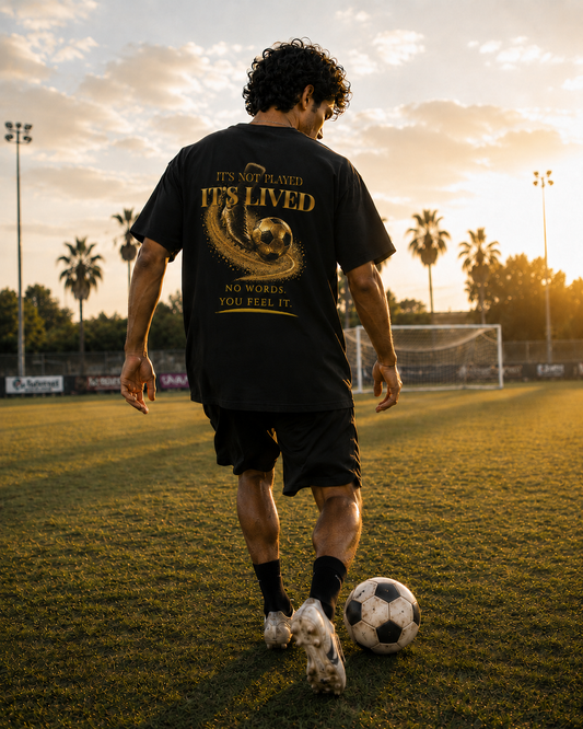 Back Print | It's not played, it's lived Tee | Gold Soccer Design